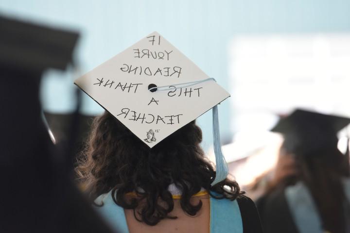 motto on graduation cap.